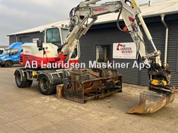Takeuchi TB295W Aftageligt Engcon Centralsmørring og skovlp
